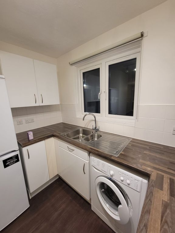 Property photo 3 of 12 Kitchen