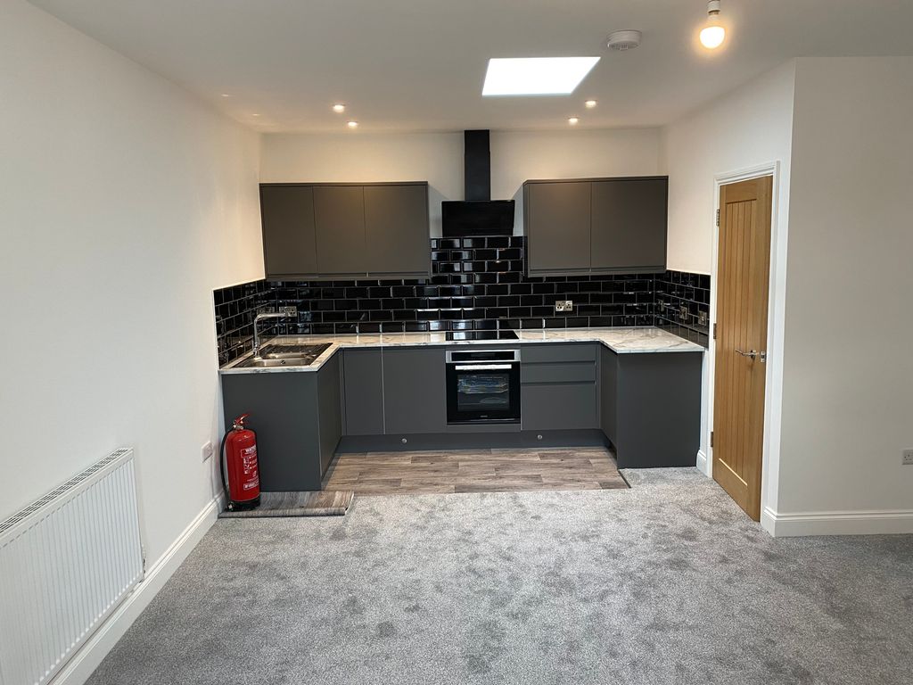 Property photo 2 of 12 Kitchen