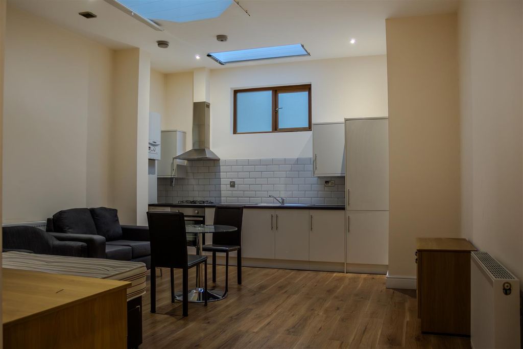 Property photo 3 of 6 Kitchen Area