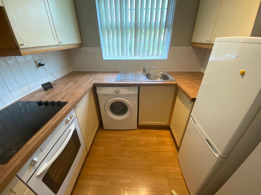 Property photo 2 of 12 Kitchen