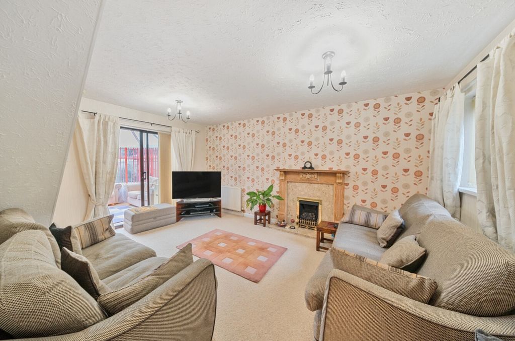 Property photo 2 of 18 Living Room With Doors To Coservatory