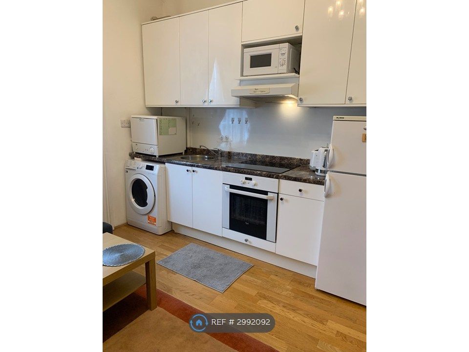 Property photo 3 of 13 Full Kitchen
