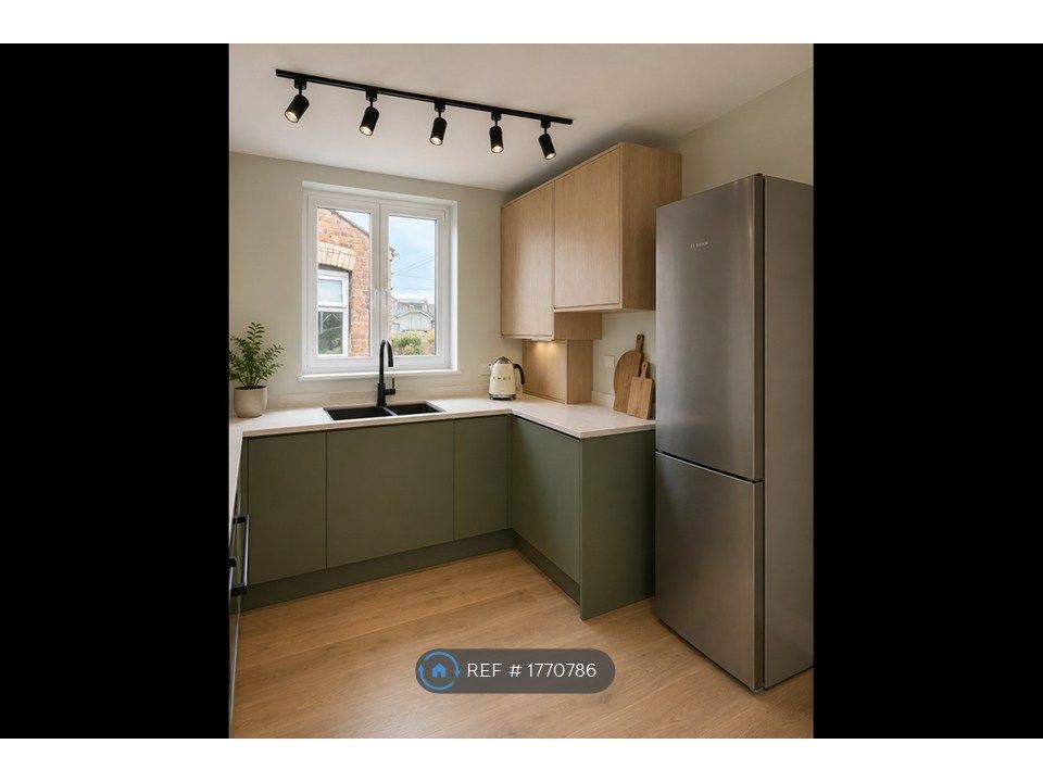 Property photo 2 of 9 Kitchen
