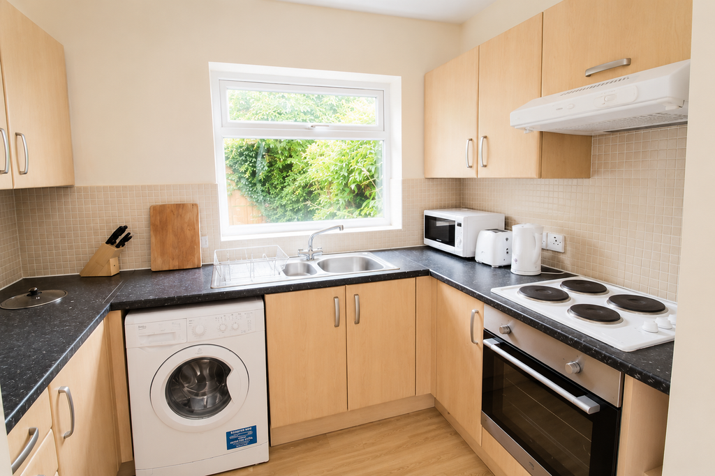 Property photo 3 of 12 Kitchen - Angle 1