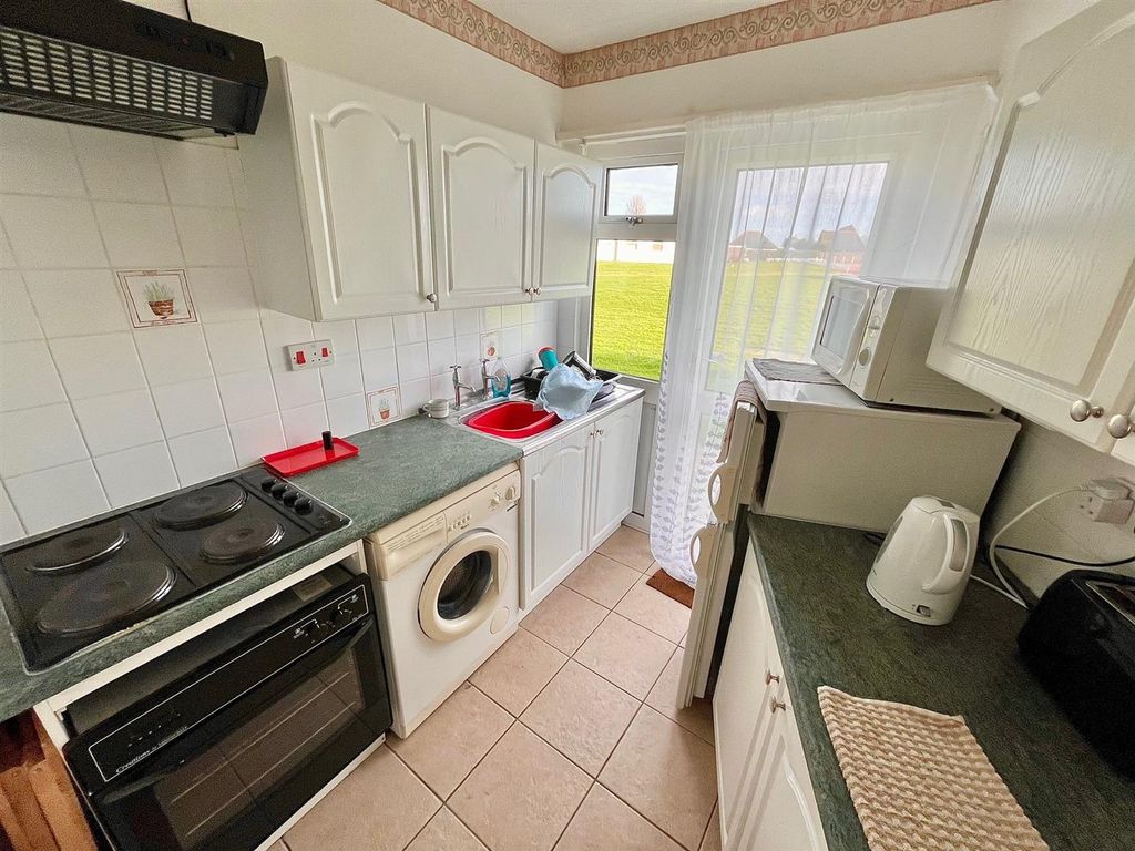 Property photo 3 of 7 Kitchen Area