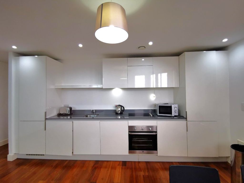 Property photo 2 of 9 Kitchen Area