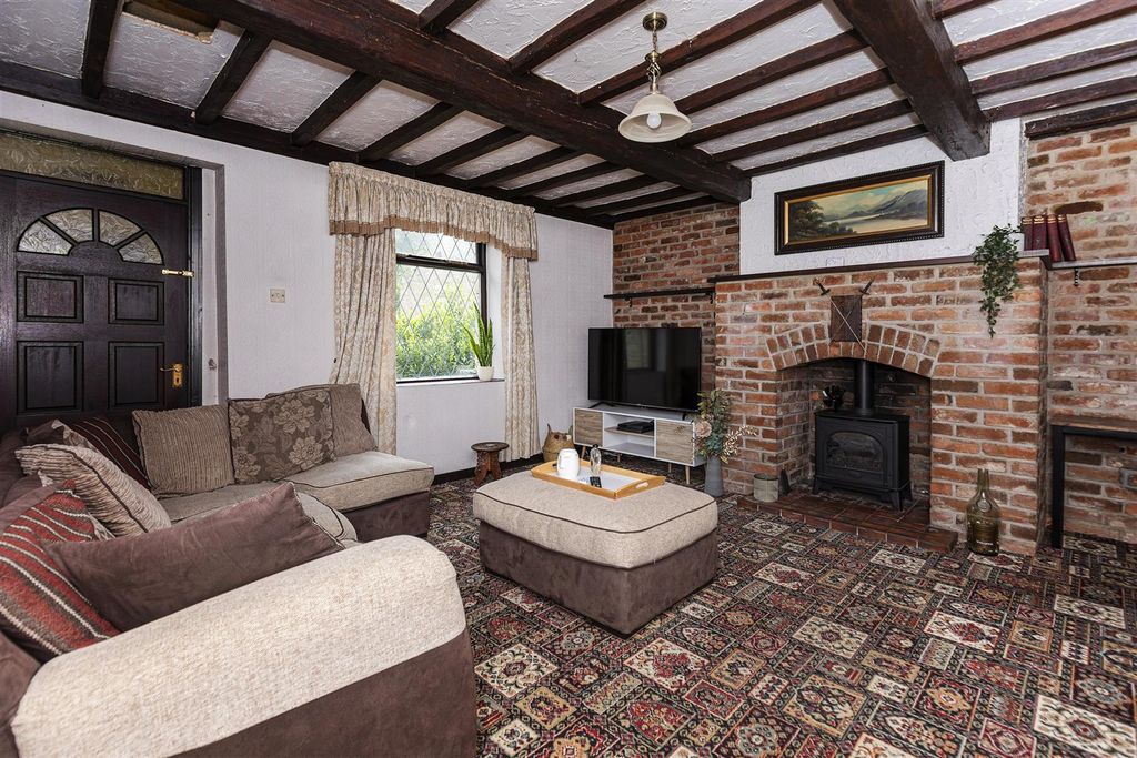 Property photo 2 of 64 Sitting Room