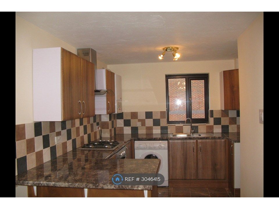 Property photo 2 of 12 Kitchen