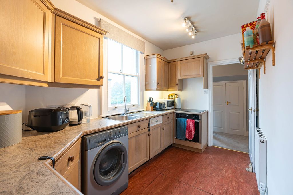 Property photo 3 of 12 Kitchen