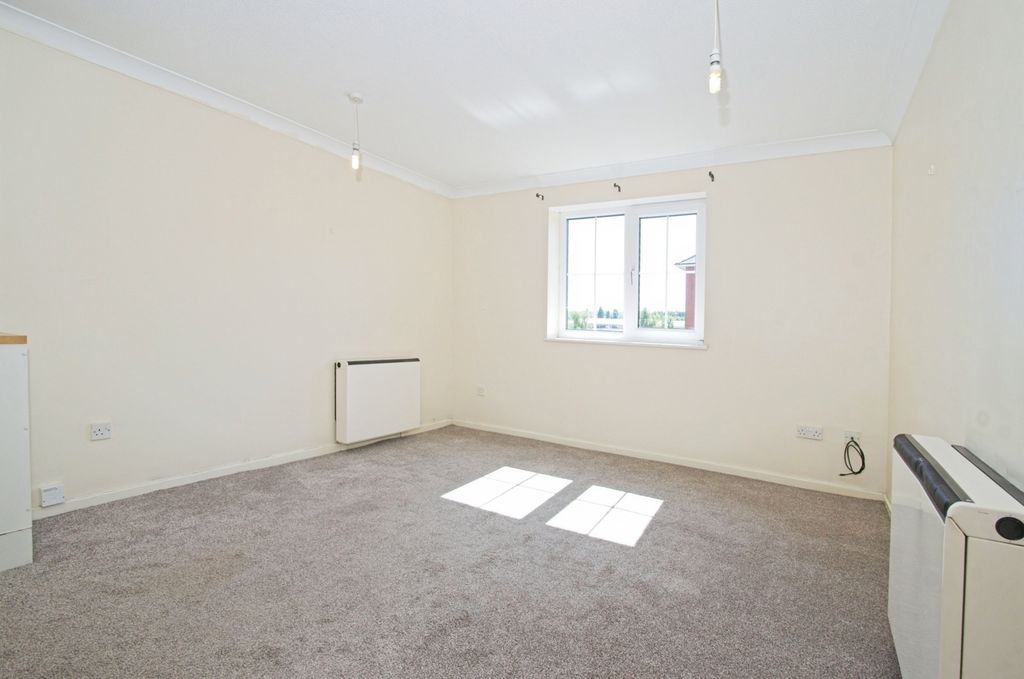 Property photo 3 of 17 Living Area