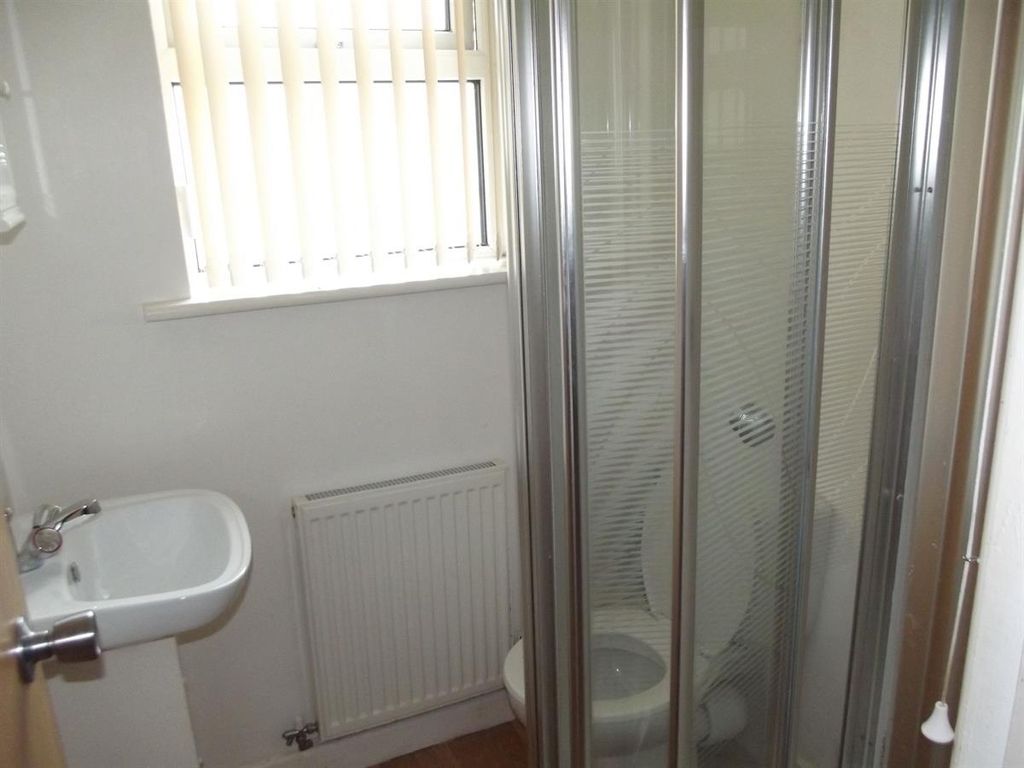 Property photo 3 of 3 A Clean And Well-Maintained Bathroom Featuring A c...