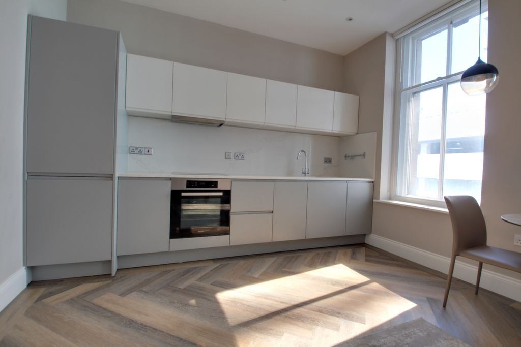 Property photo 2 of 10 Kitchen Area