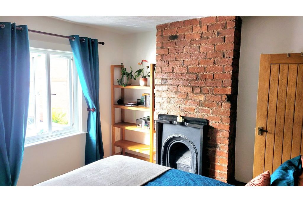 Property photo 2 of 3 Bedroom One