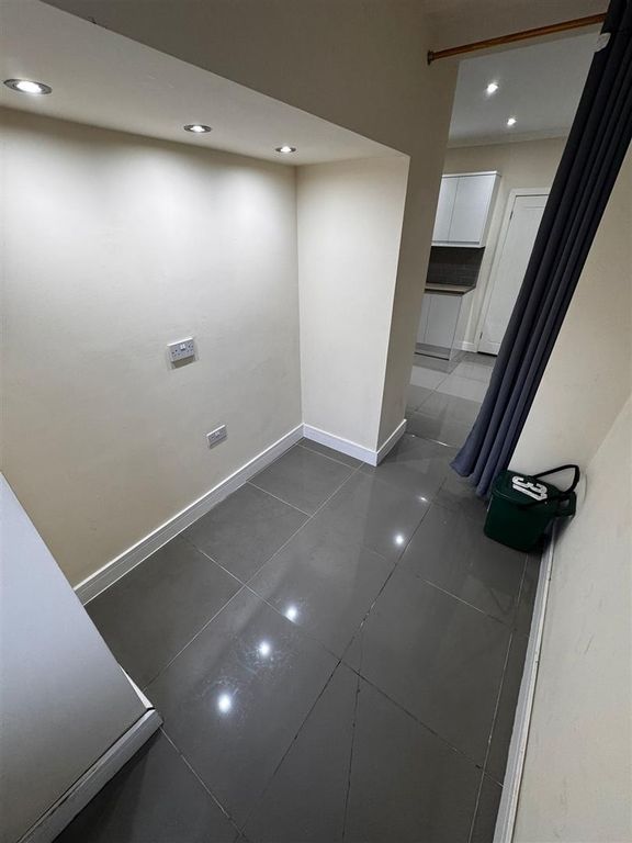 Property photo 3 of 17 Modern Utility Area With Sleek Gloss Floor Tiles...