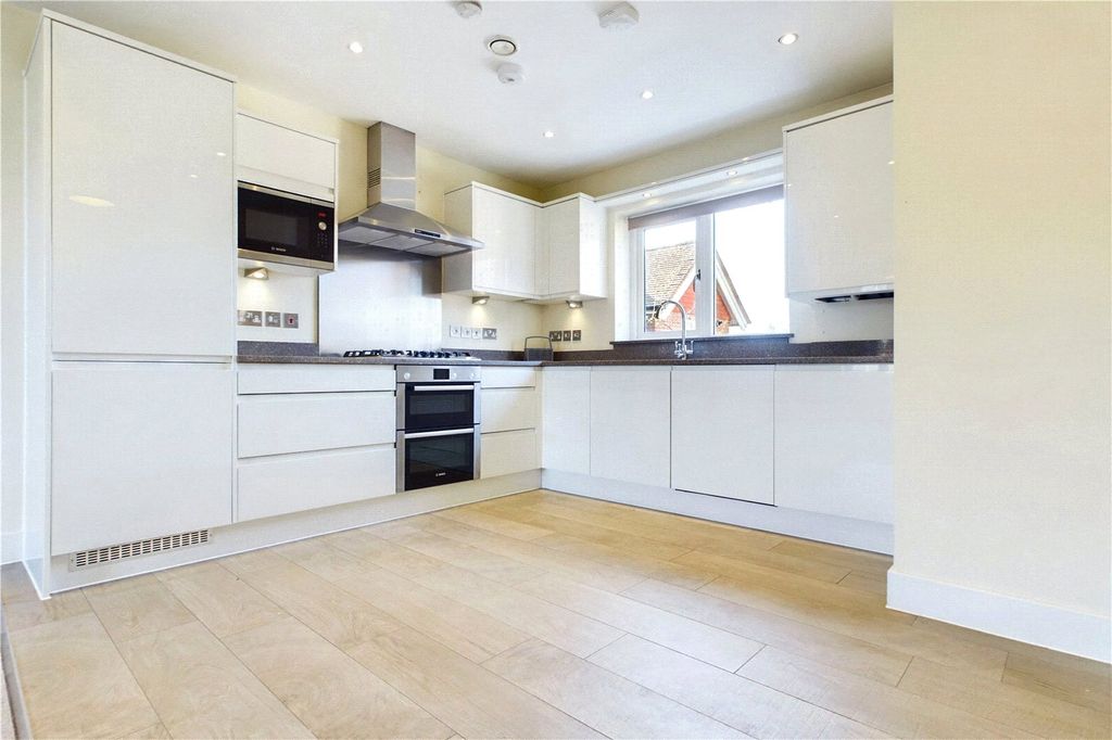 Property photo 2 of 13 Kitchen Area