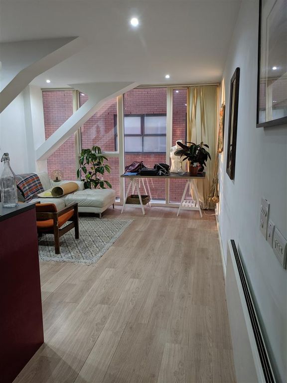 Property photo 3 of 6 Living Area.Jpg