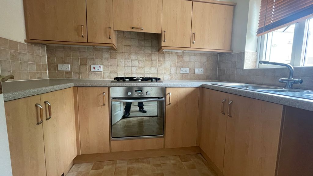 Property photo 3 of 7 Kitchen