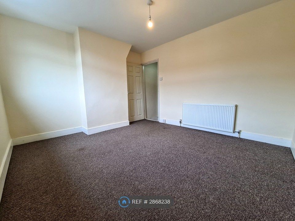 Property photo 3 of 11 Front Bedroom