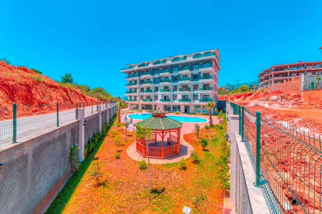 Property photo 2 of 26 A Deluxe Duplex Apartment For Sale In Alanya Â€“ Social Areas And Communal Garden