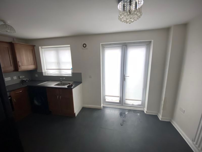 Property photo 2 of 12 Kitchen Dining