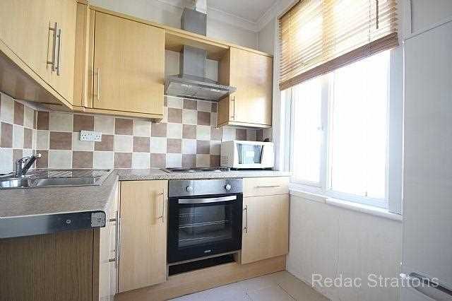 Property photo 2 of 12 Kitchen