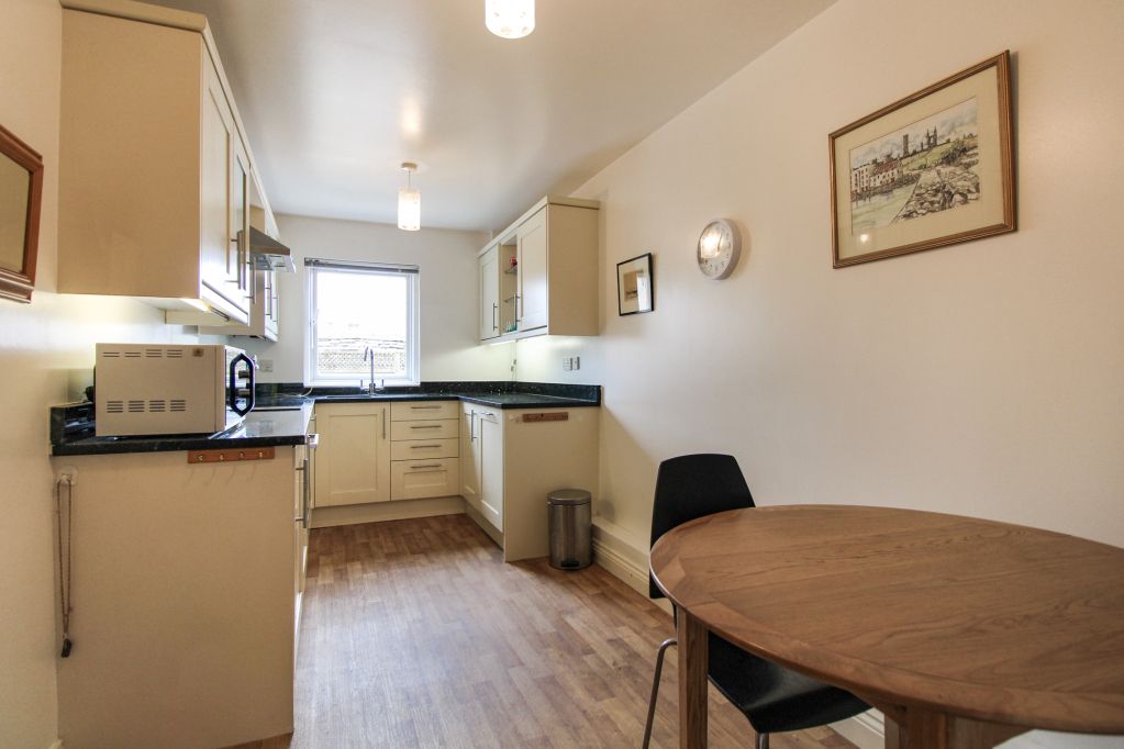 Property photo 2 of 18 Dining Kitchen