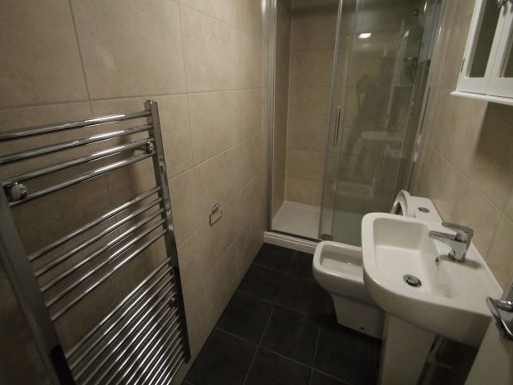 Property photo 3 of 3 A Clean And Modern Bathroom Featuring A Large Show...