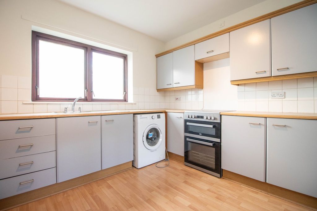 Property photo 3 of 13 Kitchen Area