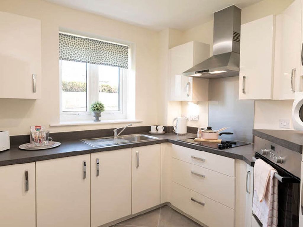Property photo 3 of 8 Typical Kitchen