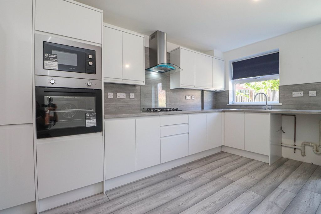 Property photo 3 of 13 Dining Kitchen
