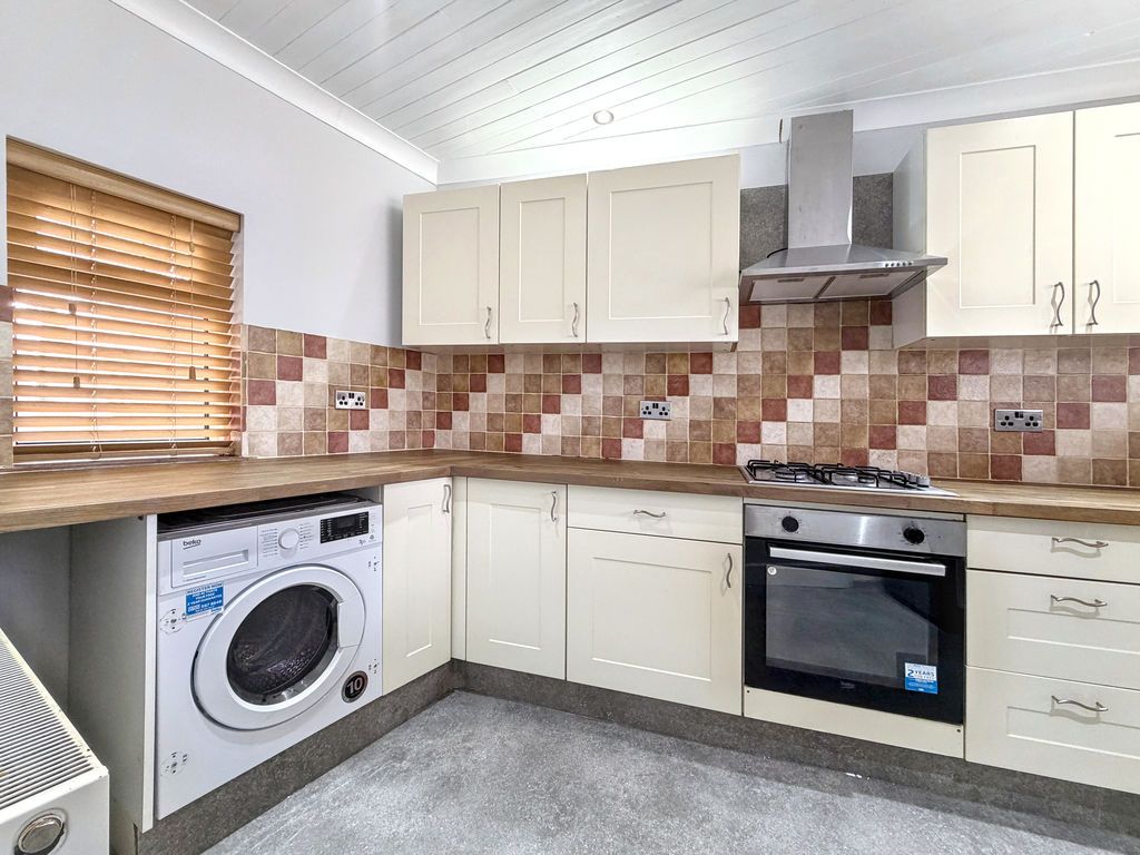 Property photo 2 of 12 Kitchen