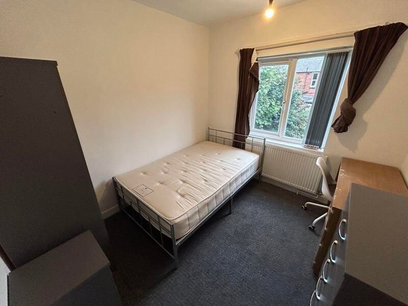 Property photo 1 of 12 A Neat And Cozy Bedroom Featuring A Single Bed, A ...