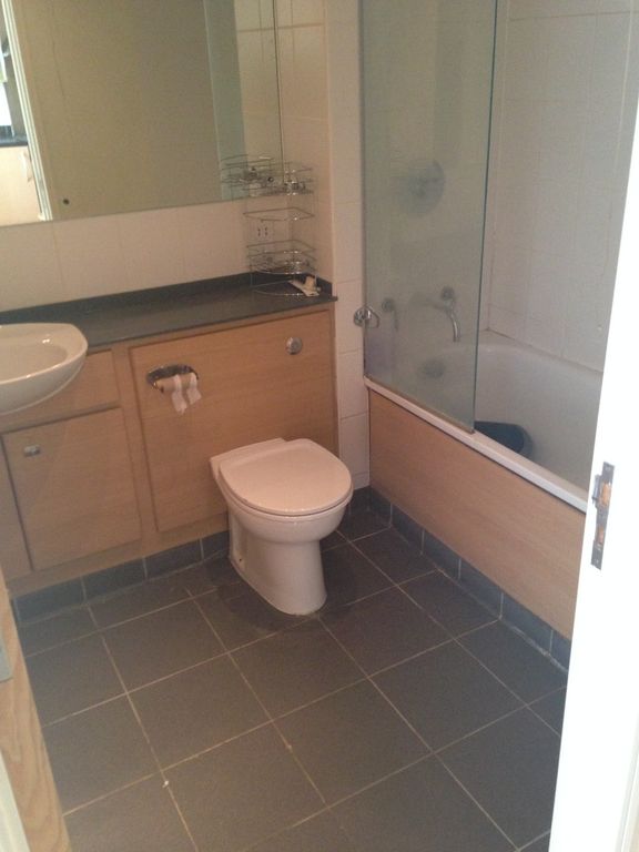 Property photo 2 of 13 A Clean And Modern Bathroom Suite Featuring A Whit...