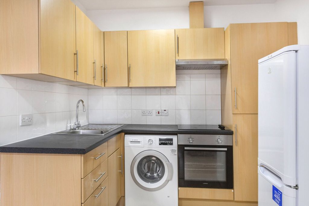 Property photo 3 of 8 Kitchen