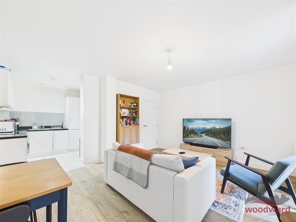 Property photo 3 of 8 Living Area