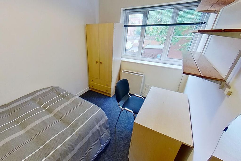 Property photo 3 of 6 Cozy Double Bedroom Featuring A Comfortable Bed, A...