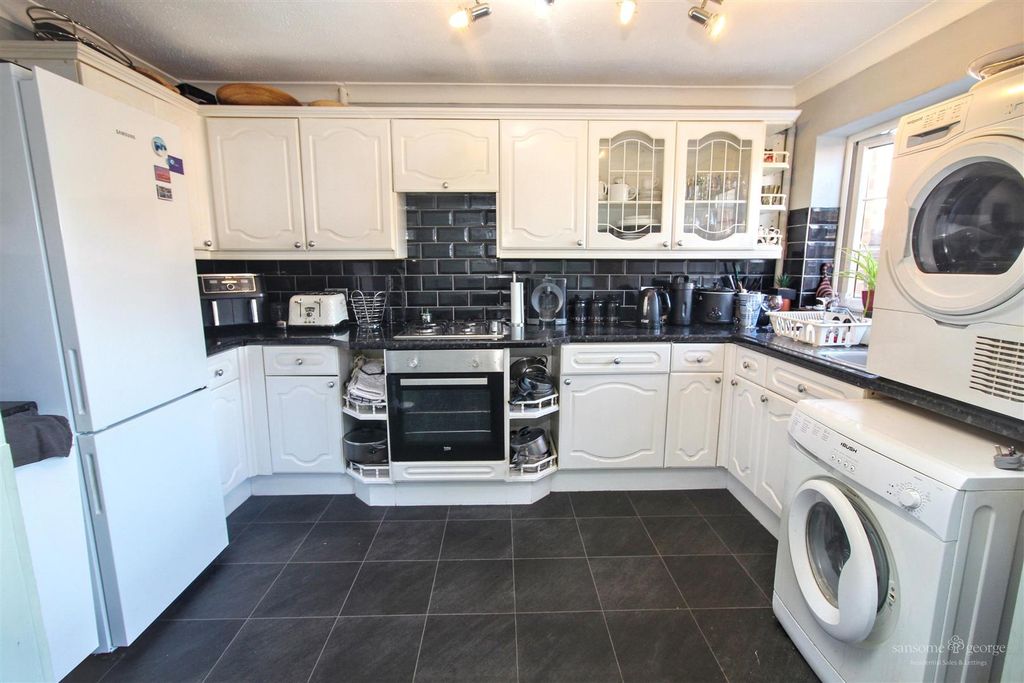 Property photo 2 of 12 Kitchen