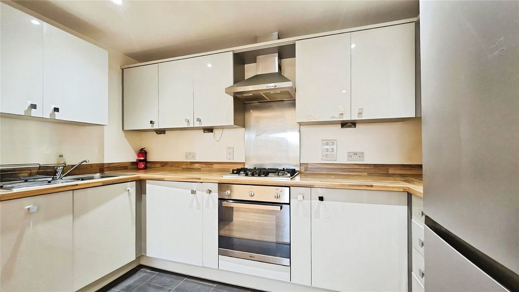 Property photo 2 of 12 Kitchen