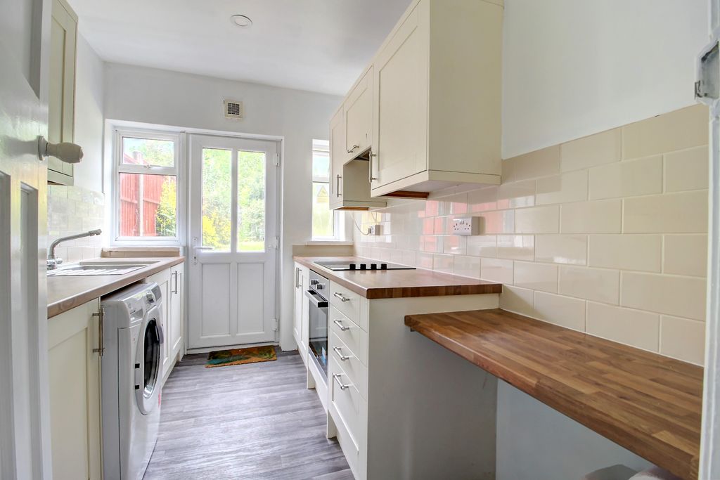 Property photo 2 of 12 Kitchen