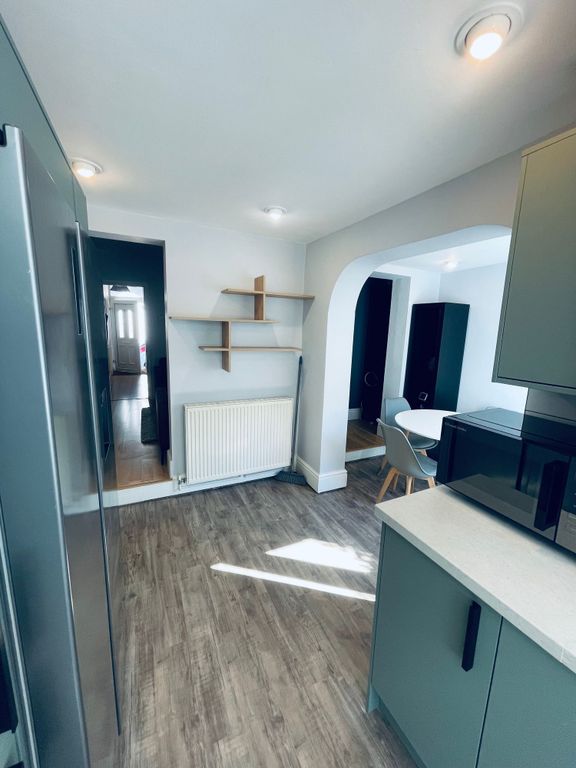 Property photo 2 of 15 Bright Modern Kitchen With Pale Cabinetry, Wood-Ef...