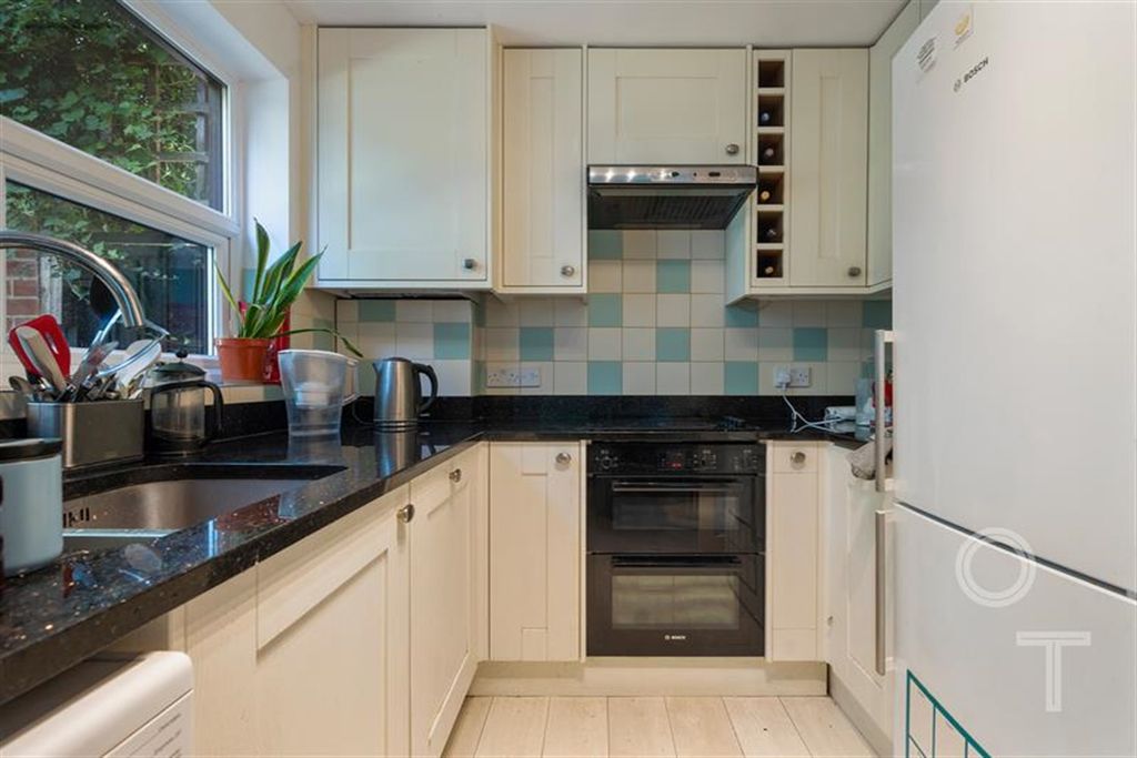Property photo 2 of 12 Kitchen