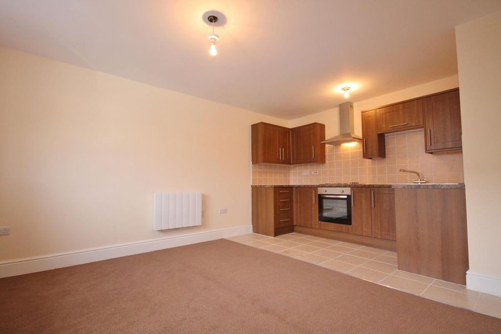 Property photo 1 of 6 Kitchen Area