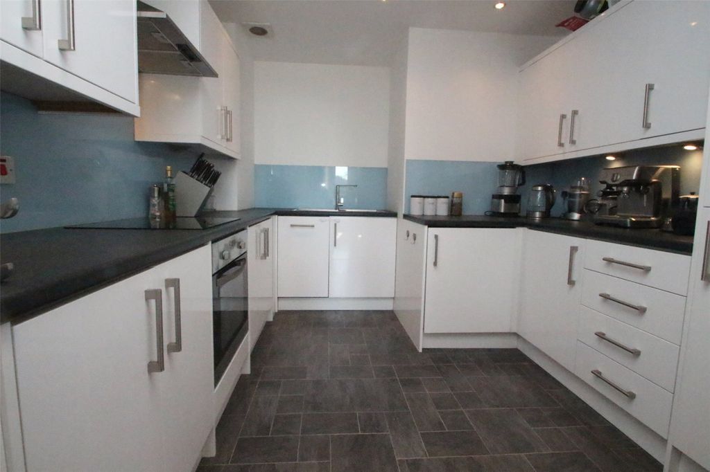Property photo 3 of 12 Kitchen