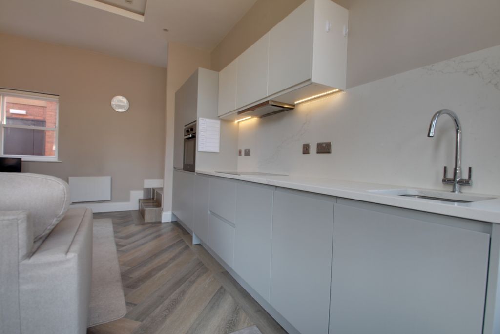 Property photo 3 of 8 Kitchen Area