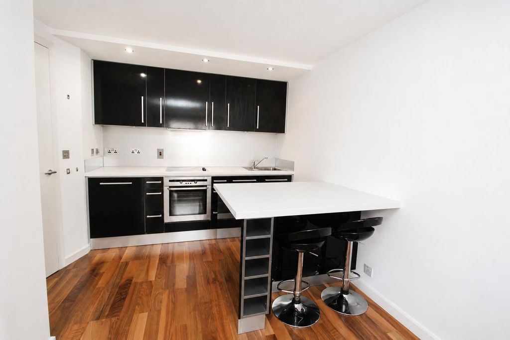 Property photo 2 of 9 Modern Black And White Kitchen With Breakfast Bar...