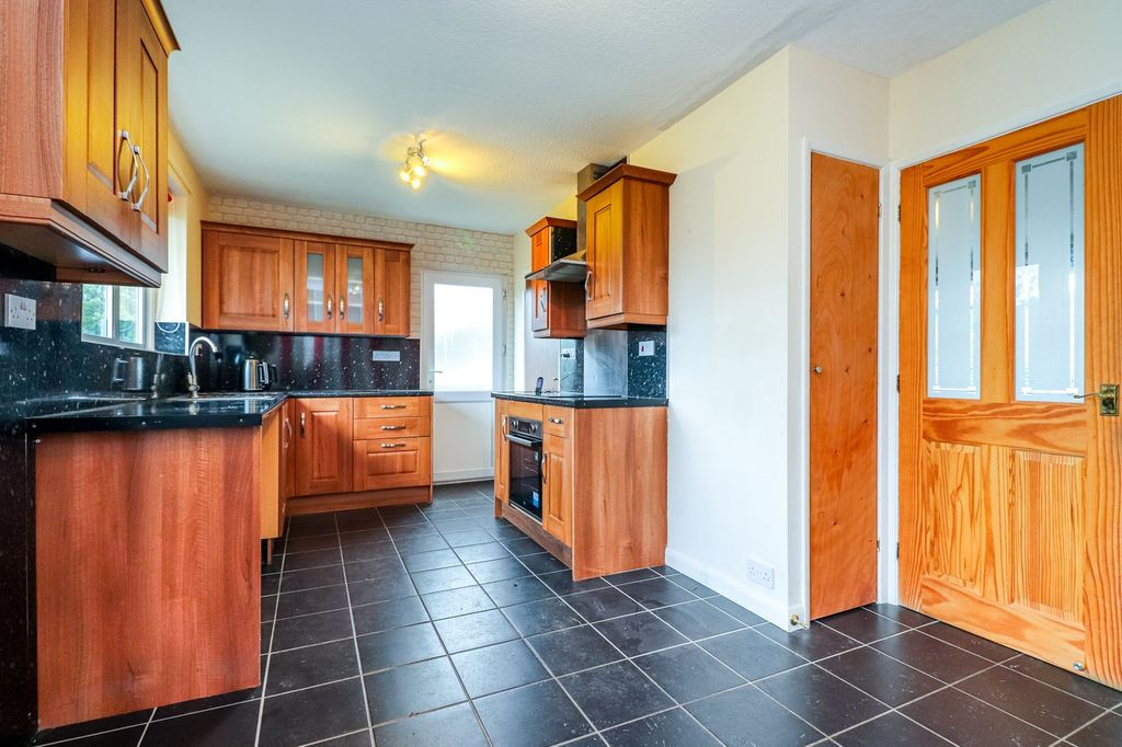 Property photo 2 of 18 Dining Kitchen