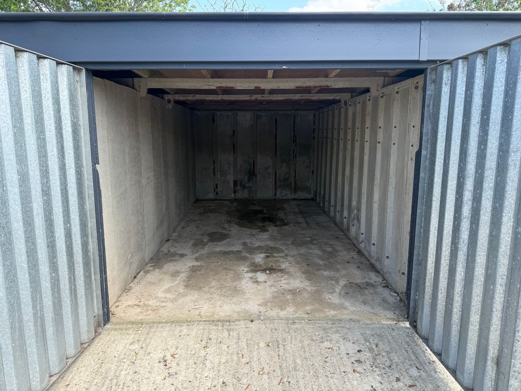 Property photo 2 of 6 Inside Garage