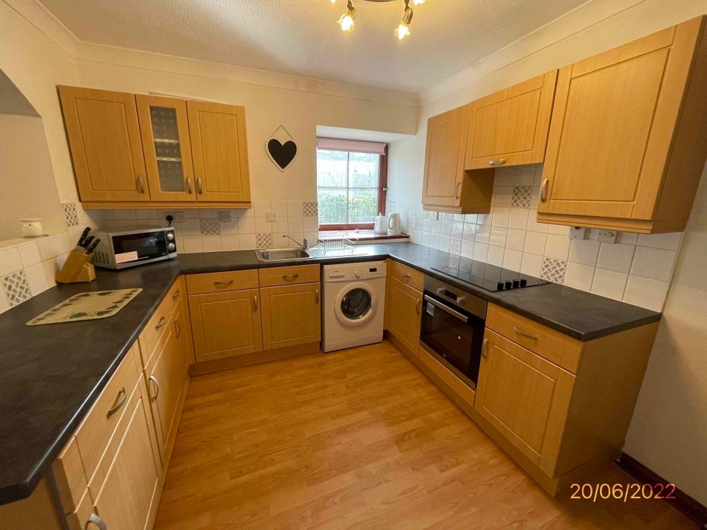 Property photo 3 of 8 Kitchen