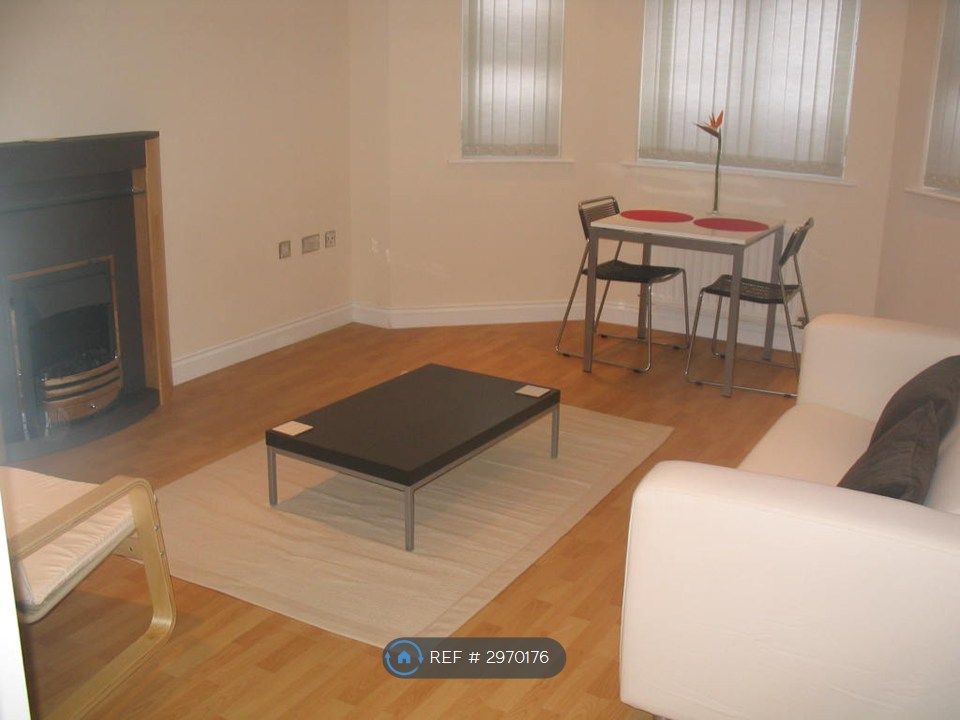 Property photo 2 of 8 Living Area