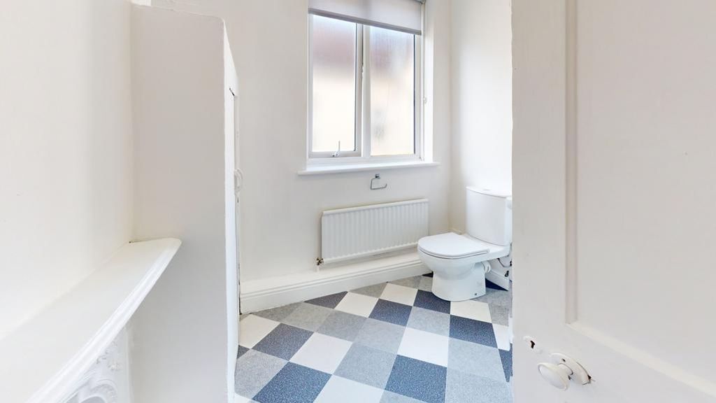 Property photo 1 of 33 A Bright And Tidy Bathroom Featuring Modern Decor ...